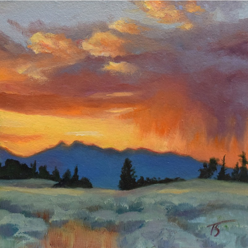 Rainy Sunset in the Tetons — a dramatic oil painting of a blazing orange, gold, and coral sunset with purple rain streaks over the blue Teton silhouette, the sage foreground glowing with warm reflections; fiery jewel tones, radiant and energetic