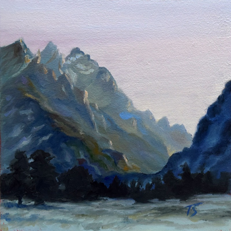 Teton Twilight — a serene, misty oil painting of the blue-grey Teton peaks at dusk under a soft lavender-pink sky, gold light on the ridges and dark evergreen silhouettes below; cool, soothing pastel tones, tranquil